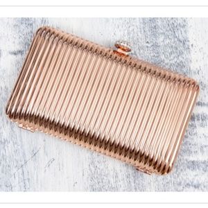 Glint Rose Gold Metal Clutch w/ Crystal Clasp